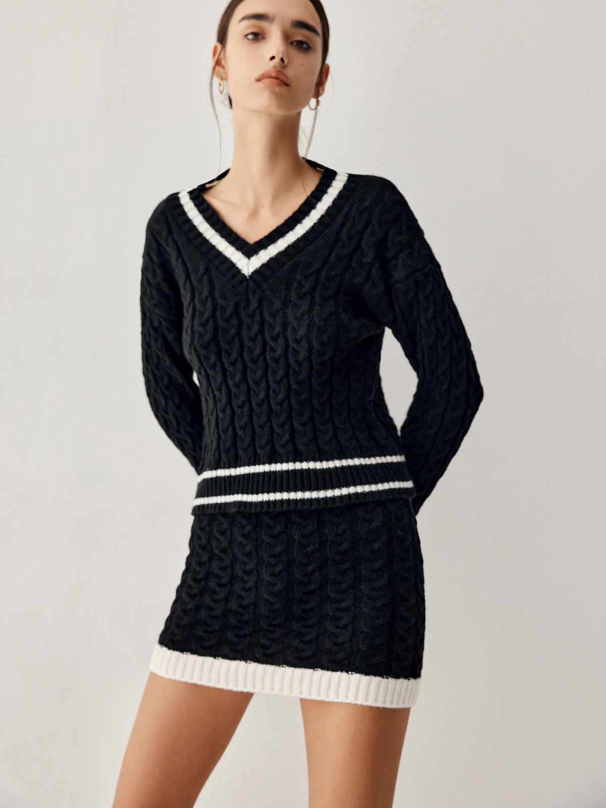 Nuvalli- Cable knit sweater with skirt