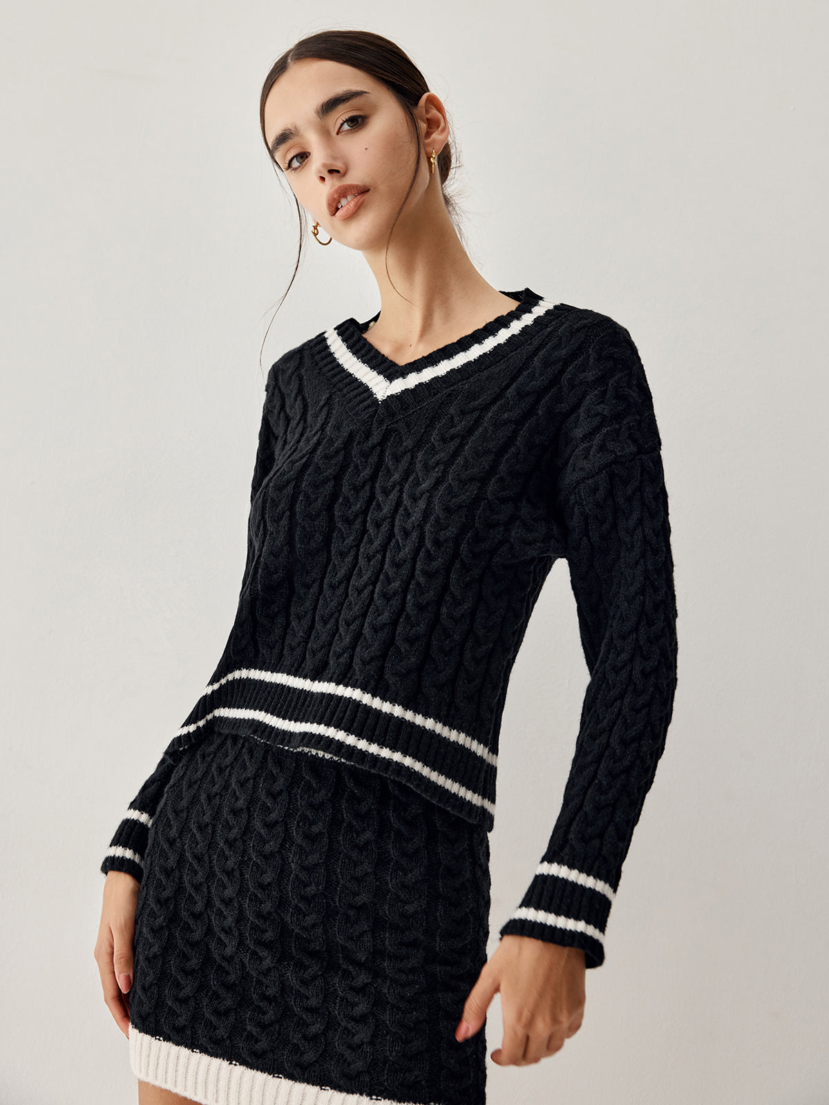 Nuvalli- Cable knit sweater with skirt