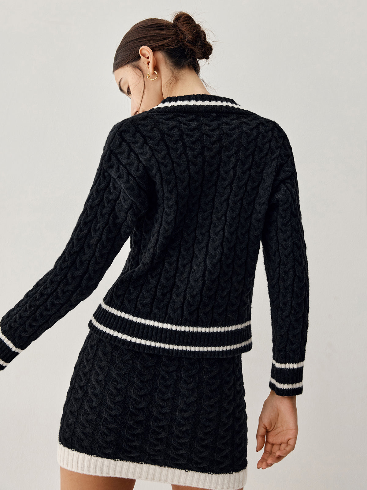 Nuvalli- Cable knit sweater with skirt